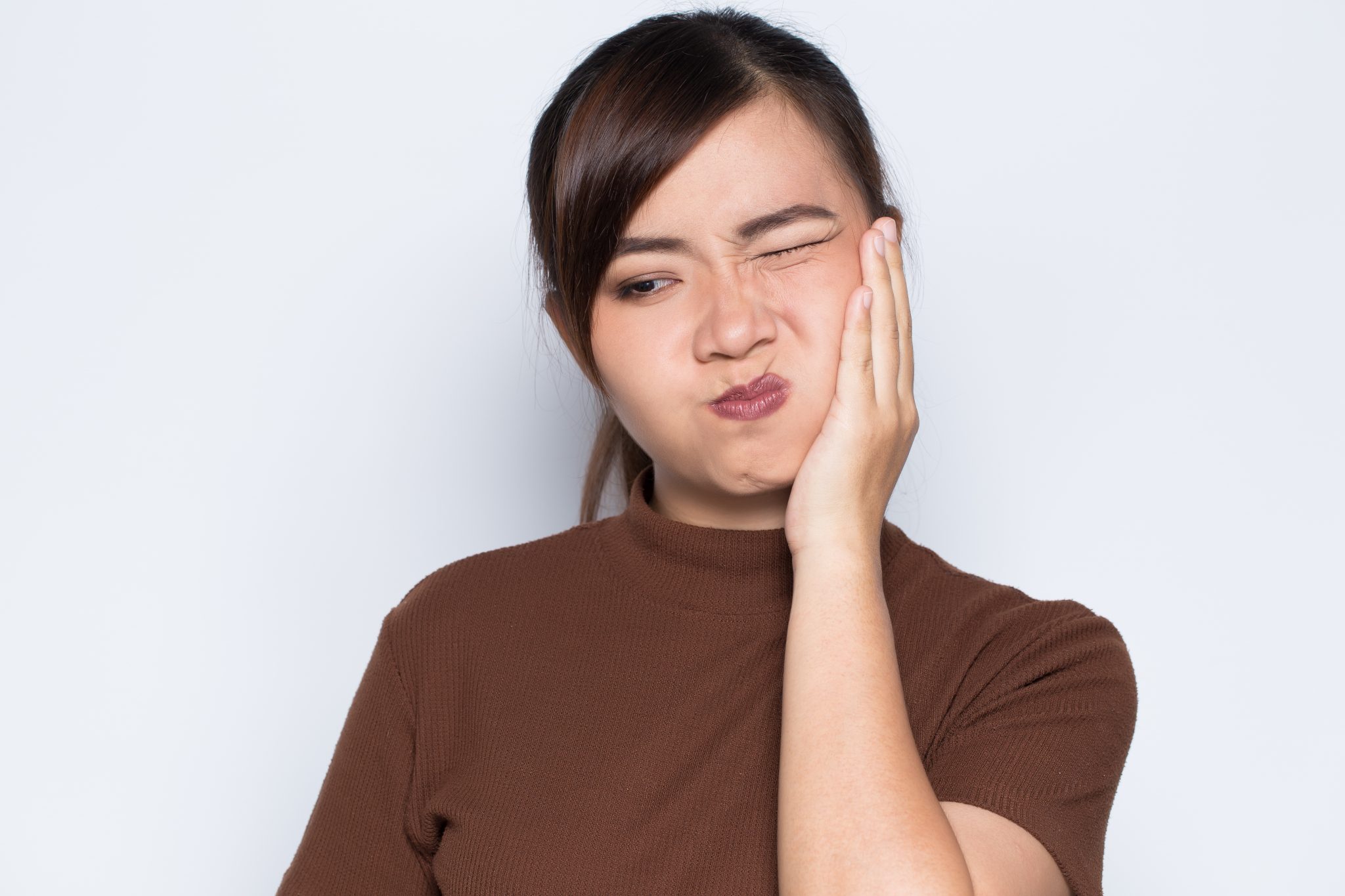 common-aches-and-pains-tmj-therapy-can-address-absolute-dental-care